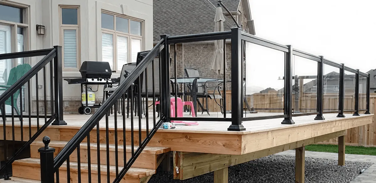 Handrail installation on a deck staircase for safety and code compliance in Providence, RI